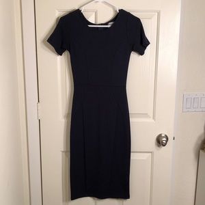 Unique Vintage 1960s style navy wiggle dress